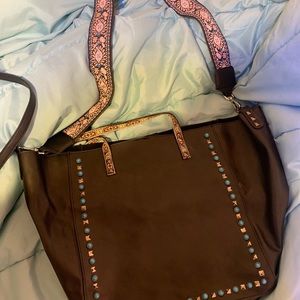 Large Black Purse w/ guitar strap. Never been used